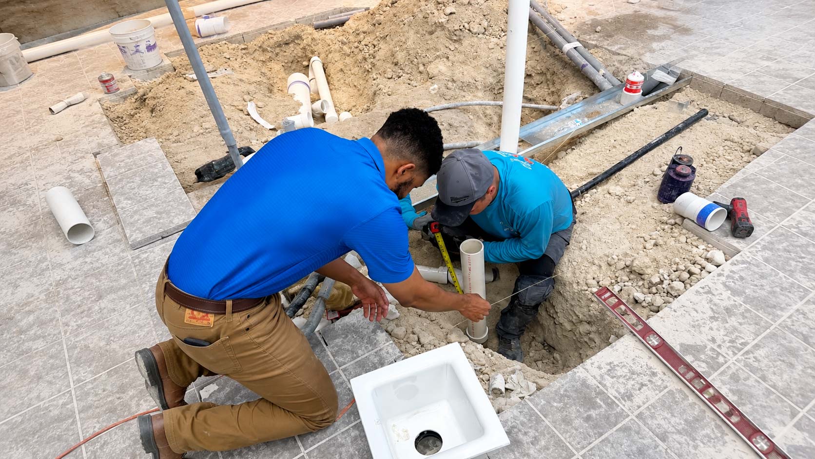 Exterior pipe excavation completed during a plumbing service project